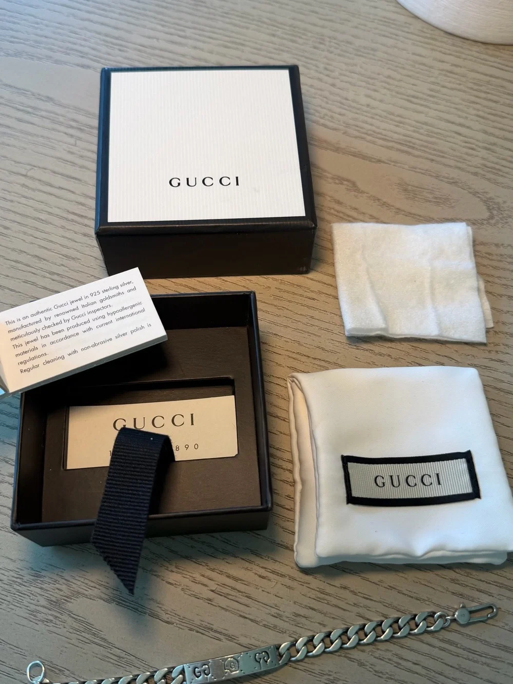 Gucci Silver Curb ID Bracelet with Branded Plate